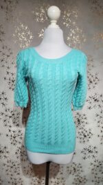 Blusa azul celeste en tela tipo tejida