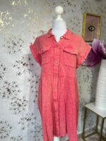 Vestido rosa de botones y olanes