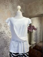 Blusa blanca manga tipo olan