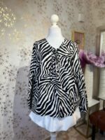 Blusa estampado de cebra manga larga