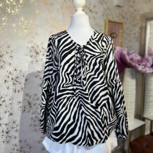 Blusa estampado de cebra manga larga